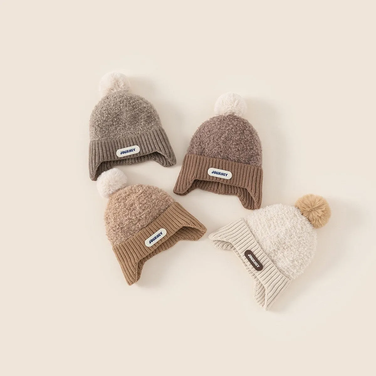 Journey Pom-Pom Knit Earflap Hat