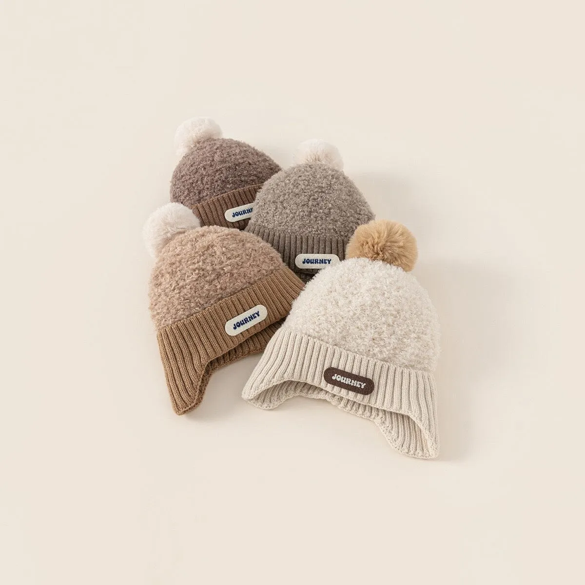 Journey Pom-Pom Knit Earflap Hat