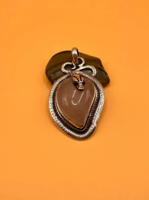 Sterling Silver Tibetan Snake Pendent with Rose Quartz